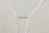 Vague crochet golden logo dress