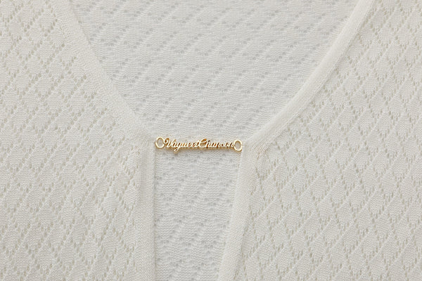 Vague crochet golden logo dress